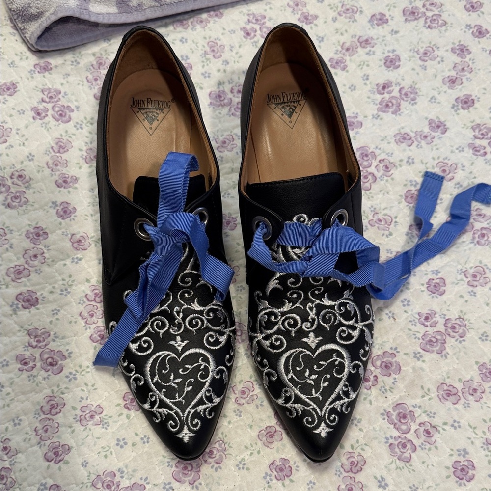 John Fluevog Black Pointed Heels with Silver Heart Embroidery and Blue Ribbon